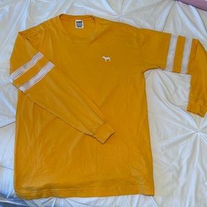 PINK long sleeve campus tee, mesh on sleeves, XS size but runs a bit big